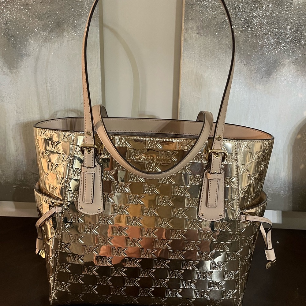 Michael Kors Gold Tote with Honeycomb Pattern and Decorative Tassels
